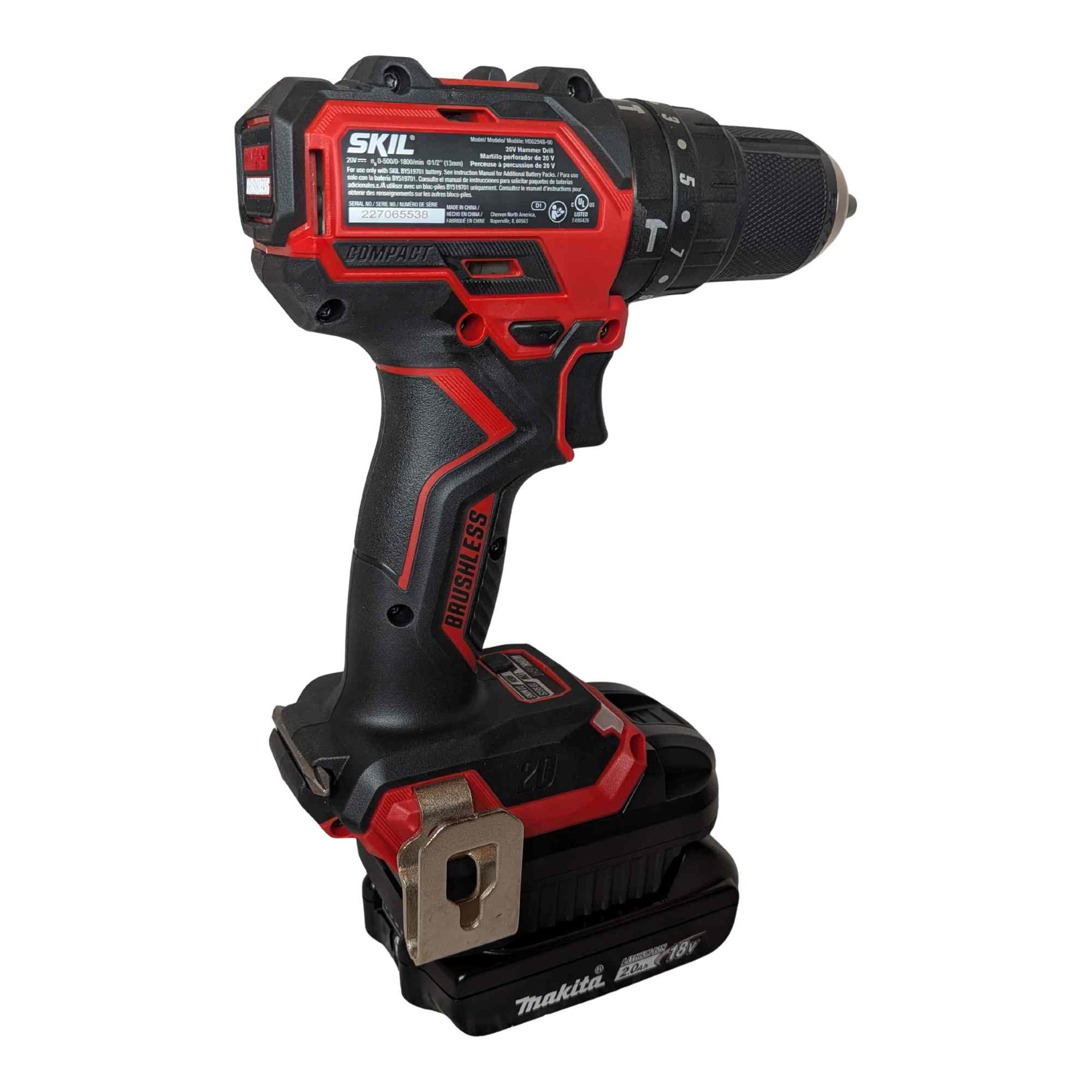 Makita 18V LXT to SKIL 20V PWR CORE battery adapter - rear view installed on a SKIL hammer drill, seated on the battery pack