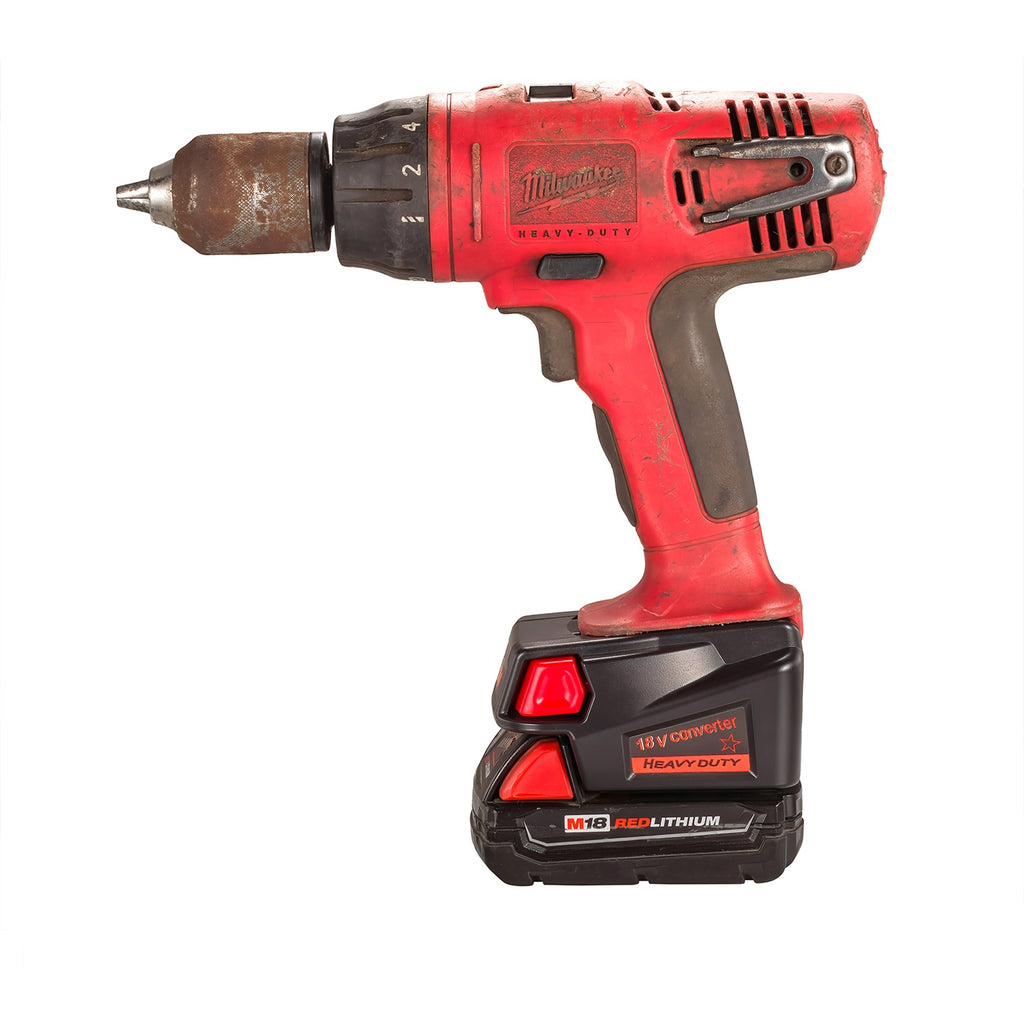 Milwaukee M18 to Milwaukee V18 Ni-Cd battery adapter - installed on a drill over the battery, side view