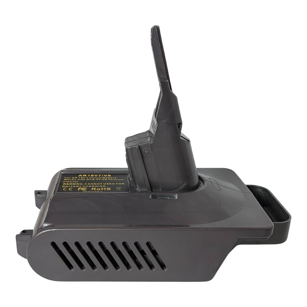 RIDGID 18V to Dyson V7 battery adapter - side view showing the Dyson tool-side stem, vent grille and warning label