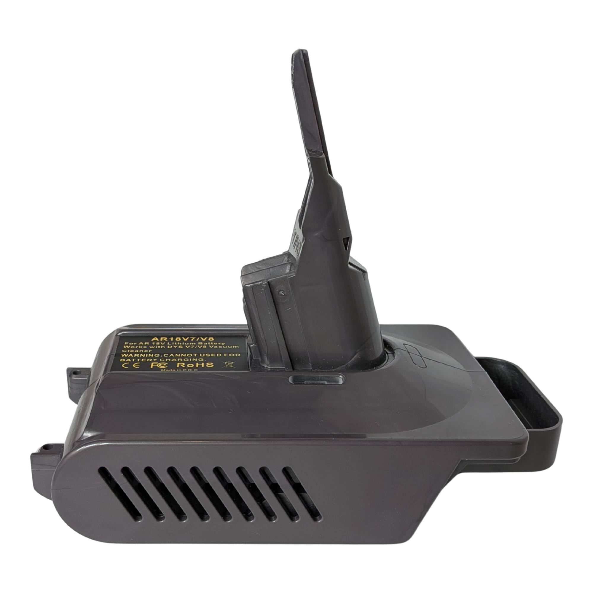 RIDGID 18V to Dyson V7 battery adapter - side view showing the Dyson tool-side stem, vent grille and warning label