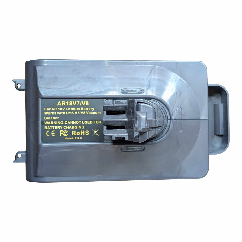 RIDGID 18V to Dyson V7 battery adapter - plan view of the top face, Dyson tool-side stem base and warning label