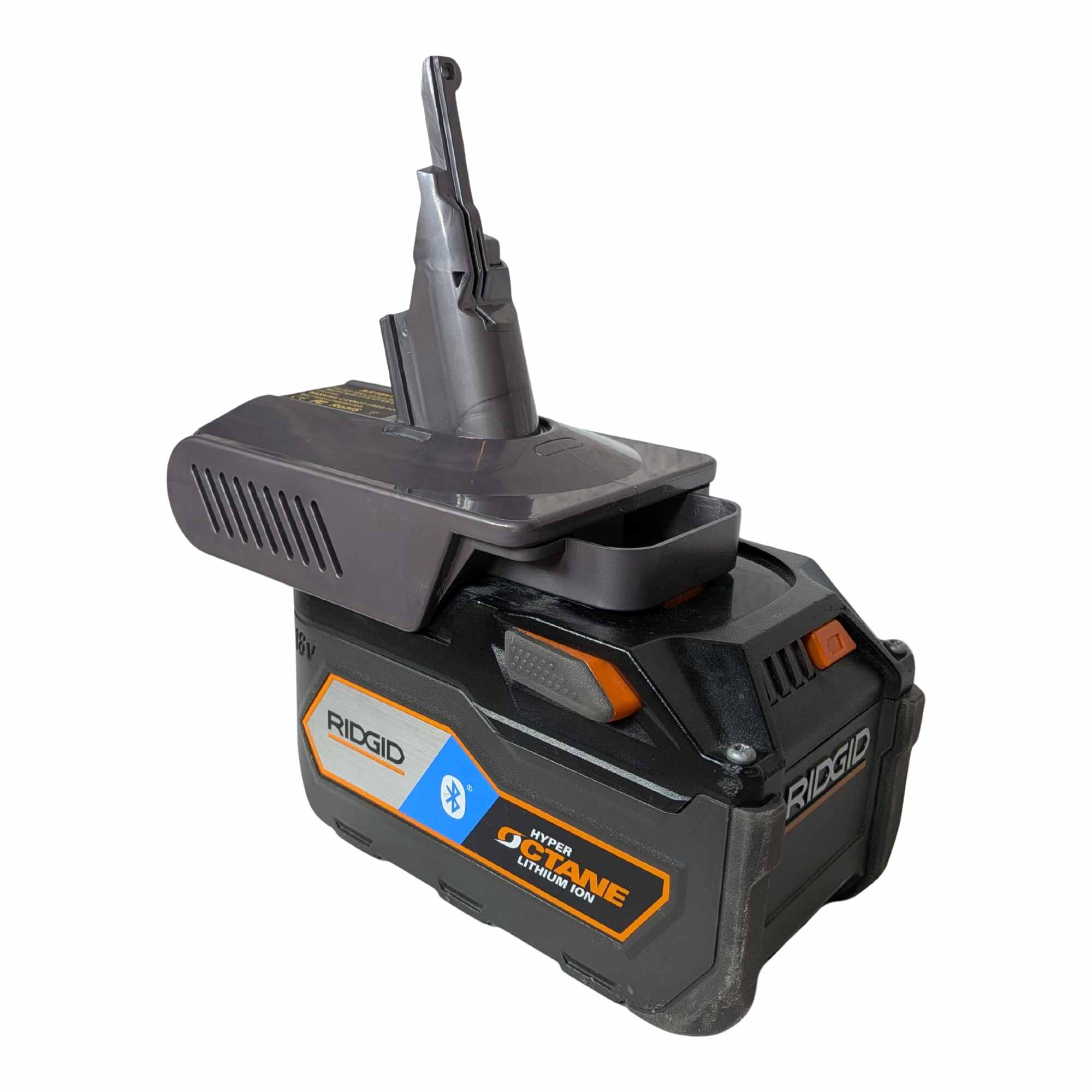 RIDGID 18V to Dyson V7 battery adapter - fitted to the RIDGID 18V battery, Dyson tool-side stem upward, side vent grille