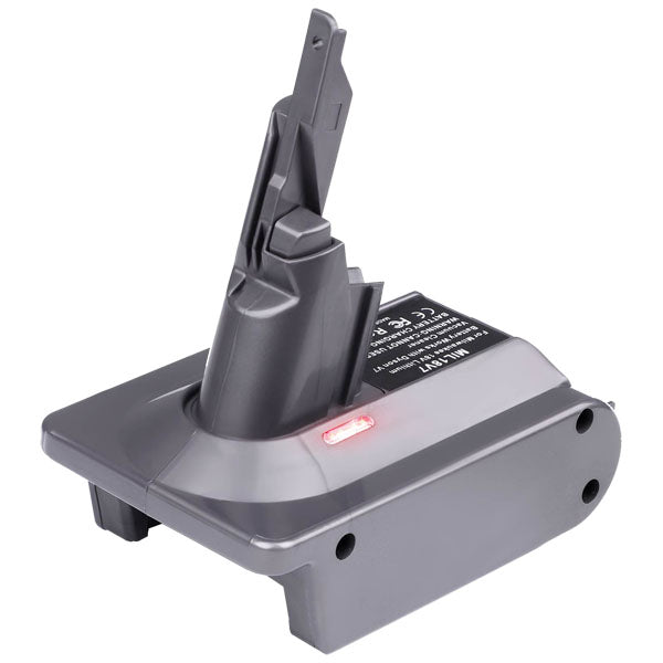 Stanley V20 to Dyson V7 battery adapter - tool-side stalk above the base, printed label and the indicator LED lit